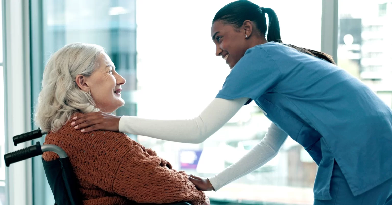 Hospice and Palliative Care Board Certification Exam Preparation Caregiver providing compassionate hospice and palliative care to elderly patient