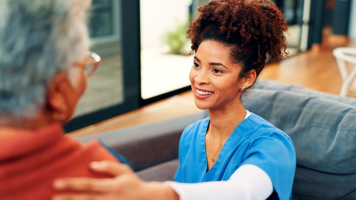 Hospice and Palliative Care CHPN nurse caring for a senior woman at home