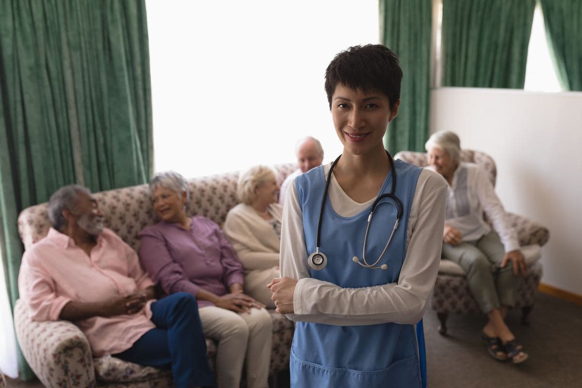 Hospice and Palliative Care healthcare professional with senior patients at home